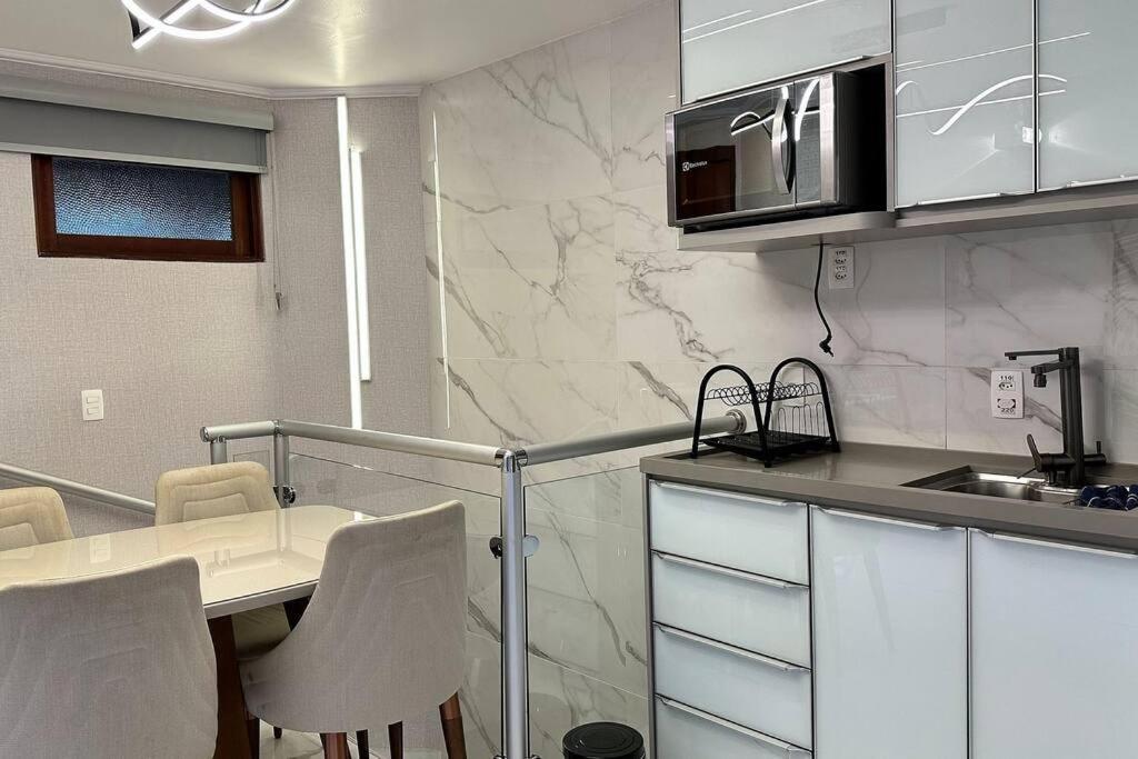 Apartamento Luxo Quatre Saisons Campos do Jordão Exterior foto